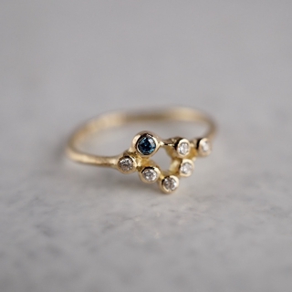 Blue diamond stardust ring