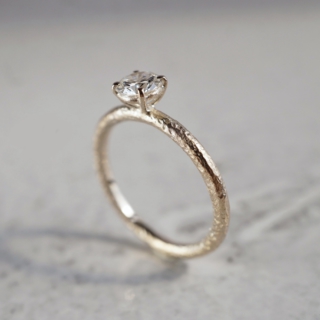 Diamond textured ring